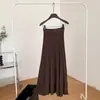 Falda de punto de línea A de cintura alta, estilo suave para mujer, corte ajustado, versátil, longitud media, falda de dobladillo ancho para ir al trabajo, Otoño 2026