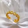 Moda Cruzada Europeia e Americana Design de Nicho Elegante Joia de Mão Aço Inoxidável Banhado a Ouro 18K Flor Anel Aberto Luxo Acessível Feminino