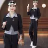 Moderna sudadera de estilo coreano con diseño de dos piezas falsas, cuello de camisa, patchwork, botones, rayas y pantalón ancho con cordón para mujer en primavera y otoño