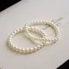 Novo Pulseira Clássica de Pérola Imitação Simples e Fashion Leve Luxo Leve Luxo Alto Padrão Versátil Contas de Concha Anel Liso Joias Atacado