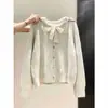 Cárdigan de punto con lazo de encaje para mujer, otoño e invierno, con botones en forma de corazón, suéter de corte holgado, top suave y femenino, prenda de abrigo
