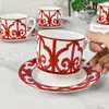 Juego de Porcelana Ósea Roja China Ventana de Hierro Española Taza de Café y Platillo Porcelana Ósea Roja China Seis Tazas y Seis Platillos Venta al por Mayor Transfronteriza