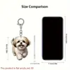 Nuevo llavero de cachorro de dibujos animados 2D plano transfronterizo de acrílico leyendo para mochilas, teléfonos móviles, bolsas de gimnasio y accesorios de equipaje