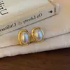 Brincos Vintage de Alta Qualidade com Pedras Preciosas Pretas e Brancas Formato Oval com Pino de Prata Brincos Coreanos Novos Tendência Design de Nicho para Mulheres Estilo Francês