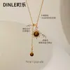 Colar Corrente de Suéter Dourado com Pedra Olho de Tigre para Mulheres, Corrente de Suéter Estilo Novo, Elegante e de Alto Padrão, Luxo Leve para Outono e Inverno
