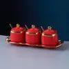 Pote de tempero de cerâmica transfronteiriço suprimentos de cozinha, conjunto de potes de tempero de luxo leve, conjunto de caixa de temperos doméstico de três peças, pote de sal requintado