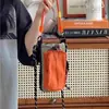 Bolsa para botella de agua estilo japonés, ligera y compacta, tipo dopamina, bolso cruzado para deportes al aire libre y viajes, nuevo modelo 2026 para botella de agua y teléfono