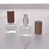 Venta al por mayor de fábrica 10 ml Decantador de perfume Mini tapa de madera maciza Portátil para viajes Botella de perfume Atomizador de niebla fina Botella de vidrio vacía