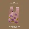 Bolsa de mão de tricô de alta qualidade com retenção automática, blocos de cores retrô, alça de pulso, versão coreana, bolsa de gato, bolsa versátil para mulheres