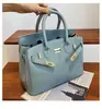 Estilo explosivo de moda transfronteiriça bolsa grande de mão feminina 2026 nova bolsa vermelha de casamento da moda bolsa tote transversal de grande capacidade