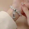 Pulsera de Ópalo nuevo estilo chino elegante estilo nacional pulsera de moda flor de loto hebilla de seguridad pulsera de estilo literario versátil venta al por mayor