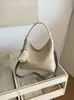 Bolsa de mão estilosa e atraente para o trajeto no outono, bolsa de ombro feminina, bolsa tote, novo design moderno, grande capacidade 2026