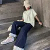 Conjunto de Verão para Meninas 2026 Nova Moda Estilo Universitário Calça Jeans de Manga Curta Conjunto de Duas Peças para Alunos do Ensino Fundamental