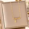 Venta caliente transfronteriza temperamento personalidad cuerpo completo titanio acero collar mujer galvanizado oro 18K cadena clavícula collar joyería no se decolora