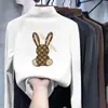 Nueva camiseta versátil de manga larga estilo coreano para otoño e invierno para niños, con cuello alto cálido y hecha de un tejido suave y cómodo