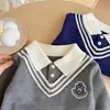 Suéter de punto para niño, estilo preppy, dos piezas simuladas, nueva colección otoño/invierno, top de punto bordado con cuello para niños