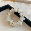 Pulsera elástica de cuentas redondas geométricas de resina Brazalete exagerado retro Pulsera de mano versátil de cara ancha transfronteriza europea y americana