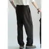 Pantalones casuales para hombre de lana con textura de espiga y cintura semi-elástica, colección otoño 2026, estilo de pierna recta con una estética "old money"