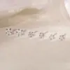 Pendientes de estrella de circón ultrabrillantes, pequeños, con orificios para las orejas y clavos en forma de hueso, exquisitos pendientes de pentagrama apilados.