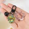 Encantador Colgante de Pata de Gato con Purpurina para Teléfono Funda para Auriculares Llavero Accesorio Correa Geométrico Fresco Creativo