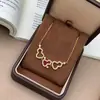 Ouro Real 24K Galvanizado Retenção de Cor Forte Moda Luxo Leve Alto Padrão Micro-Incustado Zircônia Colar Três Cabaças Corrente Versátil Exquisita