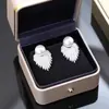 Brincos novos de zircônia e pérola requintados 2023 populares brincos elegantes luxo leve nicho único brincos de alta qualidade