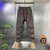 Producto Nuevo de Invierno 2025: Pantalones Casuales para Hombre, Lujosos, Resistentes al Frío, Cortavientos, Cálidos, Cintura Elástica, Terciopelo de Algodón Europeo, Sarga, Engrosados y Forrados de Felpa