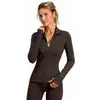 Nueva temporada chaqueta deportiva color miel y durazno para mujer otoño invierno empalmada cuello alto bolsillo para ocultar la carne cuerpo delgado fitness top de yoga