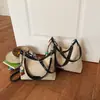 Bolso tipo cubo retro casual de gran capacidad estilo coreano para mujer, nuevo bolso de hombro y bandolera simple de moda para verano 2026