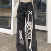 Comercio transfronterizo calle principal diseño de pierna ancha marca americana jeans rotos pantalones holgados de moda estilo callejero rudo apuesto longitud hasta el suelo