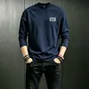 Camiseta blanca de manga larga para hombre, nuevo estilo otoño/invierno 2026, corte holgado, capa base, ropa interior, top casual para adolescentes