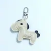 Huayang Llavero Personalizable con Colgante de Caballo de Cuero Accesorios Charms para Bolsos DIY Adornos de PU Llavero al por Mayor