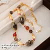 Collar de Cuentas de Cerámica Estilo Bohemio Ágata Roja Piedra Natural Collar y Aretes Color-Blocking Set de Joyería para Mujer