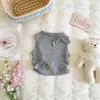 Conjunto de Verano para Bebé Niña 2026 Nuevo Estilo Camiseta sin Mangas con Lazo para Niñas Falda Corta a Cuadros Falda Floral