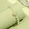 Pulsera Original de Jade Hetian de Tulipán y Trébol de Cuatro Hojas, Pulsera de Estilo Retro Chino Nuevo con un Toque de Alta Gama, Joyería de Plata Pura