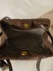 Colección Otoño 2026: Bolso de Cubo Acolchado de Cordero de Verano con Cadena, un Bolso Versátil de Hombro y Cruzado