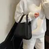 Bolsa de Mão Elegante e Simples com Textura para Mulheres 2025 Primavera Casual Elegante Versátil para o Dia a Dia Bolsa de Ombro Transversal
