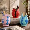 Portalápices creativo estilo chino con forma de cheongsam, contenedor de almacenamiento multifuncional para escritorio, organizador de papelería para estudiantes y pieza decorativa