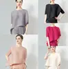 026 Top plisado para mujer, diseño moderno, estilo nicho Issey Miyake, nueva camiseta asimétrica holgada talla grande, elegante para mujer