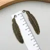 Acessórios de Joias DIY Retro Liga de Zinco Pena Folha Pingente Colar Brincos Chaveiro Pingente Fabricante Atacado