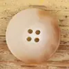 Suéter liso de resina simple y versátil con doble botón, manga corta y cuello polo para el trayecto diario de invierno