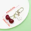 Artículo Popular de Comercio Exterior de Amazon: Llavero de Resina de Color Sólido con Goteo de Aceite Perla Cereza Accesorio de Llavero de Metal Colgante Pequeño