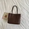 Bolso tejido de gama alta de nicho para mujer, nuevo bolso tote vintage de otoño 2026 para el trabajo, bolso de hombro de gran capacidad