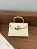Bolsa 2026 Nuevo Estilo de Moda Segunda Generación Bolso Kelly 22cm Hebilla Plateada Primavera Verano Sentido de Alta Gama Bolso para Mujer Hombro Único Cruzado de Hombro Bolso de Mano