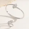 Pulsera y anillo geométricos en forma de abanico con incrustaciones de diamantes, superventas transfronterizos, conjunto nuevo, venta al por mayor de fábrica punk rap hip-hop europeo y americano