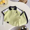 Conjunto de verano de manga corta para niños, ropa de verano nueva, POLO de bloques de color, elegante conjunto de dos piezas para niños y bebés, fresco y moderno