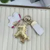 Nuevo Colgante de Pony de Dibujos Animados en Imitación Oro, Pinza para Teléfono en Forma de Cuchara, Colgante para Bolso, Estilo Minimalista Moderno Personalizado
