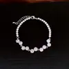 Pulseira redonda geométrica transfronteiriça com zircônia, toque de luxo leve de nicho de alta qualidade, simples e elegante, acessório de mão versátil