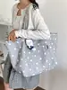 Bolsa de lona con estampado de leopardo para mujer, bolsa de gran capacidad, nuevo modelo 2026, bolso de mano de estrella transfronterizo, bolso de hombro para el trabajo, bolsa versátil