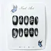 Uñas press-on cortas cuadradas-redondas estilo ojo de gato negras con accesorios florales plateados hechos a mano, geniales y elegantes, piezas de arte de uñas terminadas desmontables